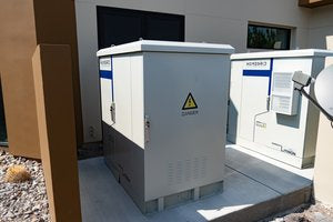 Load image into Gallery viewer, HomeGrid PowerCube Power Station - 15K Sol Ark + 19.2kWh Lithium Bank + Temp Controlled Enclosure